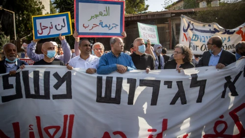 Joint Arab List Knesset member Ahmad Tibi, Palestinians and left-wing activists protest against the expulsion of Palestinian families from their homes in eastern Jerusalem, in the city's Sheikh Jarrah neighborhood. April 16, 2021. Photo by Yonatan Sindel/Flash90.