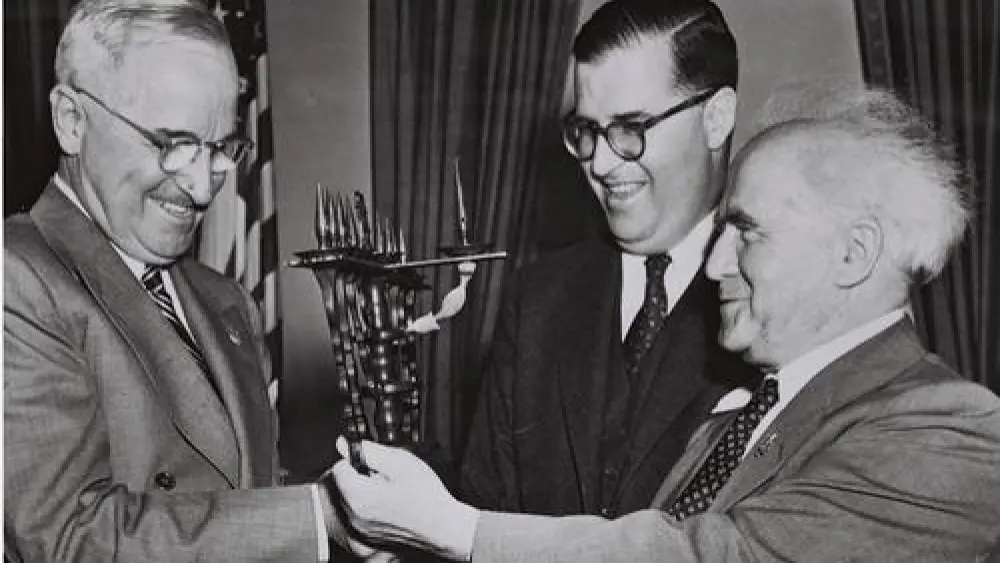 U.S. President Harry S. Truman, Israeli Ambassador to the United States Abba Eban and Israeli Prime Minister David Ben-Gurion in the White House on May 1, 1951. The Israeli leaders presented Truman with a menorah. Credit: Fritz Cohen via Wikimedia Commons.