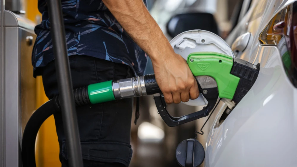 A man pumps gas at a filling station in Jerusalem, on June 28, 2022. Photo by Olivier Fitoussi/Flash90.
