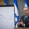 Israeli Prime Minister Benjamin Netanyahu meets with the heads of the right-wing parties to discuss the results of Israel's March 2 elections. The Hebrew text on teh whiteboard reads "Zionist right: 58, Zionist left, 47." March 4, 2020. Photo by Yonatan Sindel/Flash90.