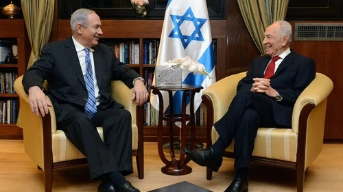 Click photo to download. Caption: Israeli Prime minister Benjamin Netanyahu meets Israeli President Simon Peres on March 16 in Jerusalem to inform Peres that he has formed an Israeli government coalition with the Yesh Atid, Jewish Home and Movement parties. Credit: Kobi Gideon/GPO/FLASH90.