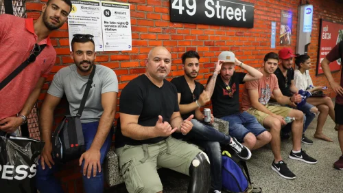 IDF veterans wait for the subway in Manhattan. Source: belevechad.nyc.