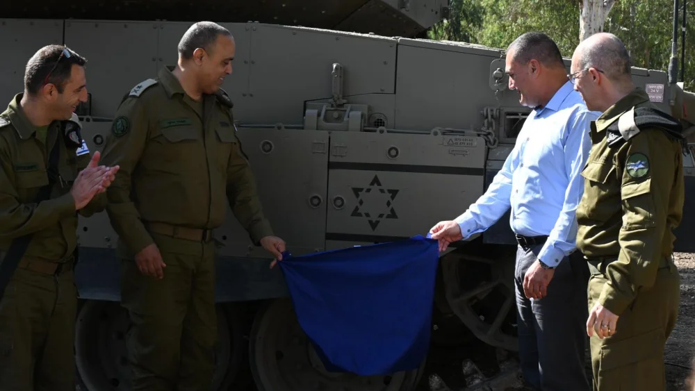 The IDF's new "Shield of Steel" emblem, created in honor of the country's 75th anniversary, is unveiled in an official ceremony at Latrun, on May 31, 2023.