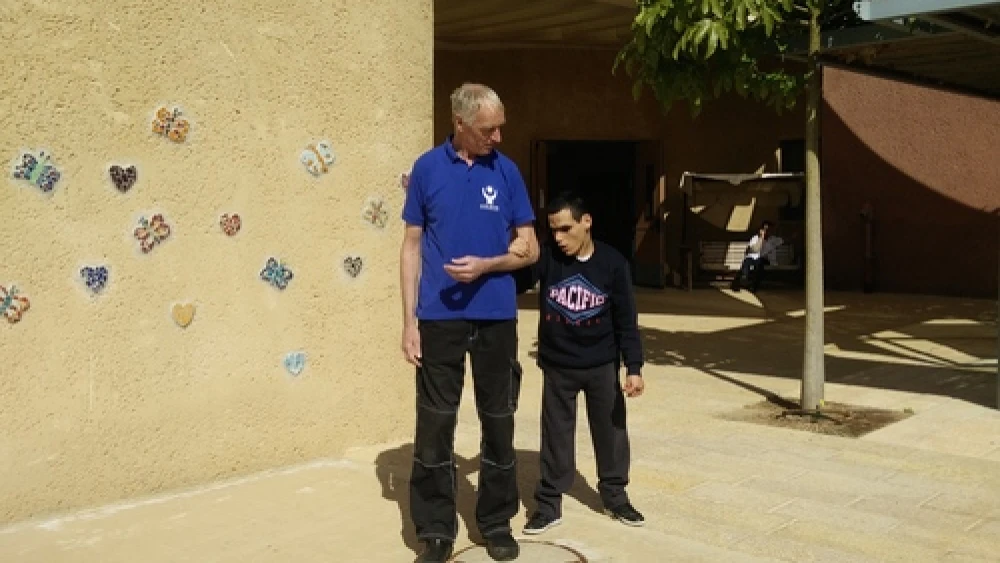 Peter Von Brockhausen (left) and Elad Sair at the Aleh Negev-Nahalat Eran rehabilitation village in southern Israel. Credit: Courtesy Jewish National Fund.