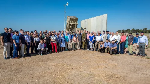 More than 70 Democrats and Republican members of Congress pose in front of an Iron Dome battery on a tour of Israel. Source: Minority Leader Kevin McCarthy via Twitter.