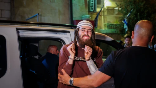 Homicide suspect Elisha Yered arrives for a hearing at the Jerusalem Magistrate's Court, Aug. 5, 2023. Photo by Chaim Goldberg/Flash90.