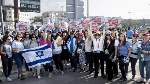 Momentum women join the families of captives in Gaza marching in Modi'in for their release, Nov. 16, 2023. Photo by Aviram Waldman.