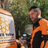 A United Hatzalah volunteer medic treats a patient during an emergency response in Israel. Credit: United Hatzalah.