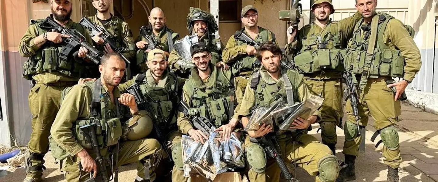 IDF soldiers receive protective equipment from One People, a civilian group that formed shortly after Hamas's Oct. 7 attack on Israel. Photo courtesy of One People.