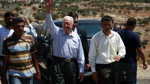 Former U.S. President Jimmy Carter during a visit with the organization Elders at a checkpoint near the West Bank village of Bilin near Ramallah on Aug. 27, 2009. .Credit: Mohamar Awad/Flash90.