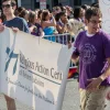Representatives of the Religious Action Center of Reform Judaism march in a June 2014 gay pride parade in Washington, D.C. Credit: Tim Evanson via Wikimedia Commons.