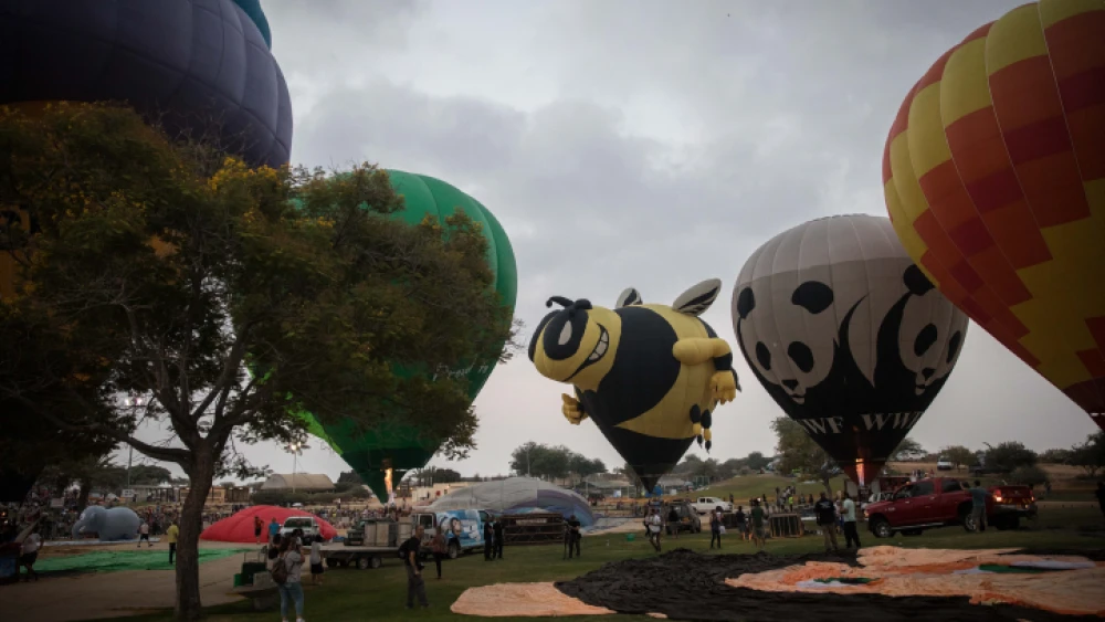 The annual International Hot Air Balloon Festival, held at the Besor National Park in the Negev Desert in southern Israel, on Aug. 11, 2017. Photo by Hadas Parush/Flash90.