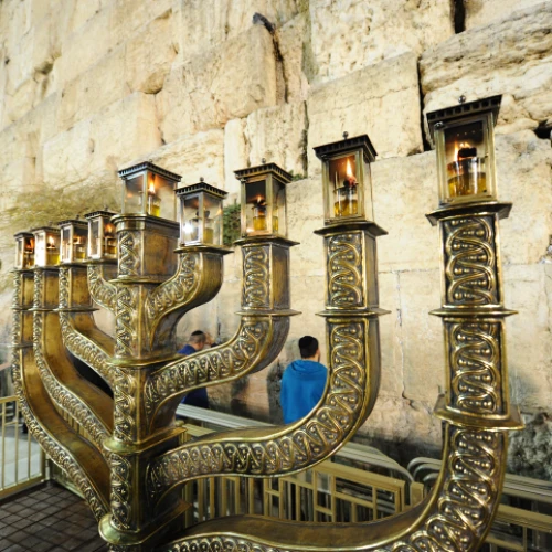 A Hanukkah menorah on the last night of the eight-day Jewish holiday, at the Western Wall in the Old City of Jerusalem, on Dec. 19, 2017. Photo by Mendy Hechtman/Flash90.