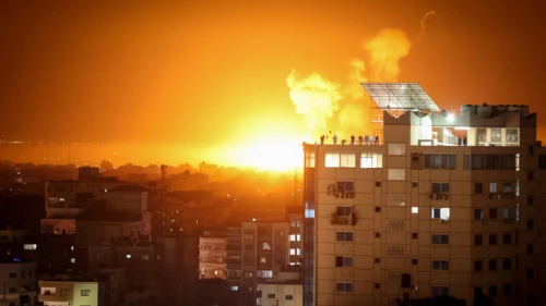 Flames rise above buildings in the Hamas-ruled Gaza Strip after Israel conducts airstrikes in response to rocket fire, April 6, 2023. Photo by Atia Mohammed/Flash90.