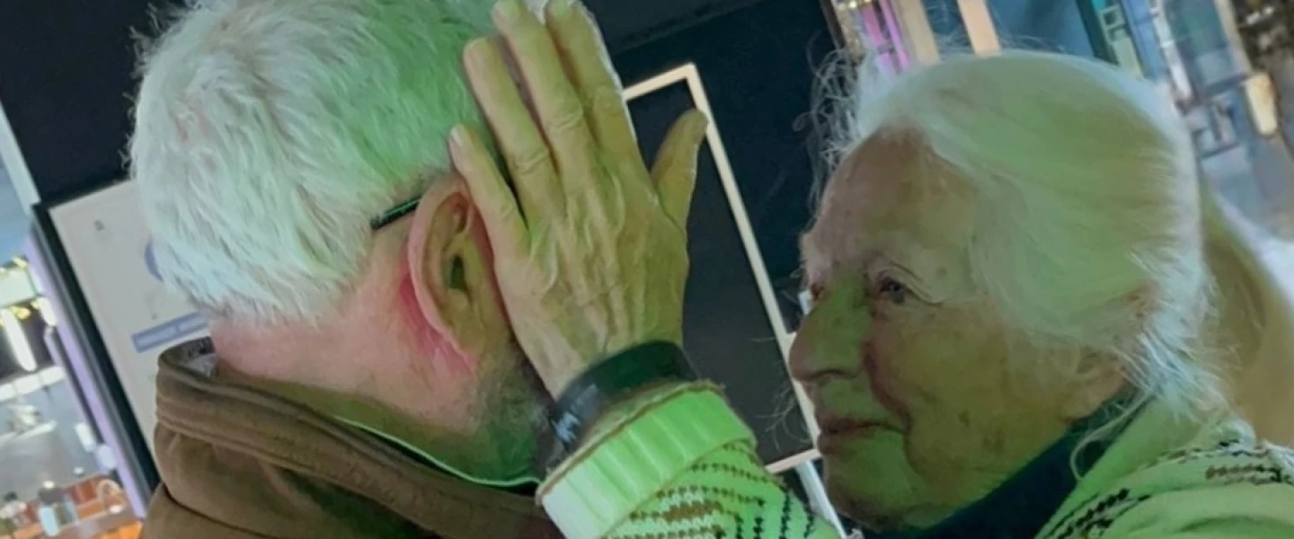 Reunited after 80 years two child survivors light a memorial torch at Auschwitz