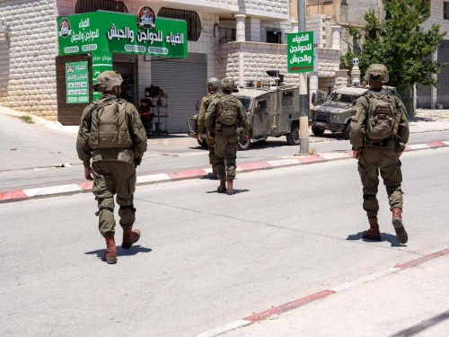 Israeli troops arrest a Palestinian terrorist in Awarta, near Nablus (Shechem) in central Samaria, May 16, 2024. Credit: IDF.