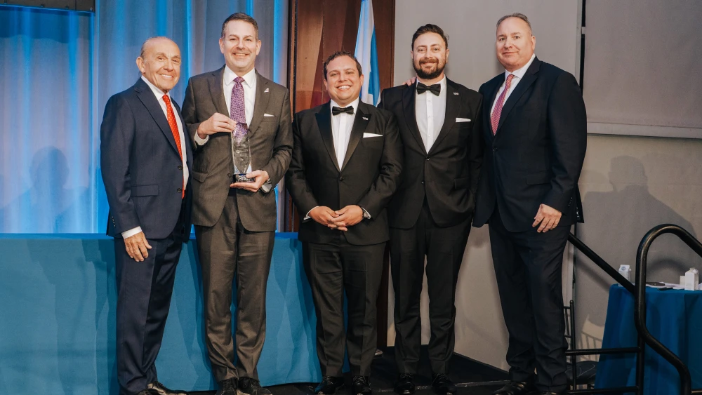 At the Auschwitz Jewish Center Foundation's 2026 gala are (from left) Simon Bergson, chairman of the Auschwitz Jewish Center Foundation; Stephen Neuman, senior vice president and global head of government affairs at American Airlines; Zak Rakrouki, American Airlines customer-care manager at Los Angeles International Airport; Mohamad Najjar, control-center manager at Los Angeles International Airport; and Jack Simony, director general of the Auschwitz Jewish Center Foundation. Credit: Courtesy of AJCF.