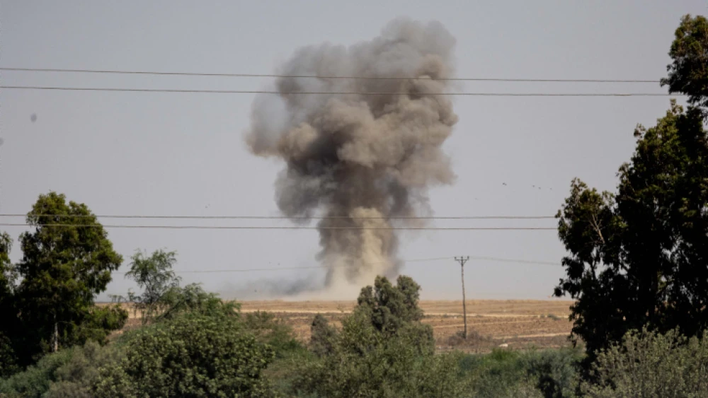 A cloud of smoke rises after a rocket launched from the Gaza Strip hit an open field near Sderot on Aug. 7, 2022. Photo by Yonatan Sindel/Flash90.