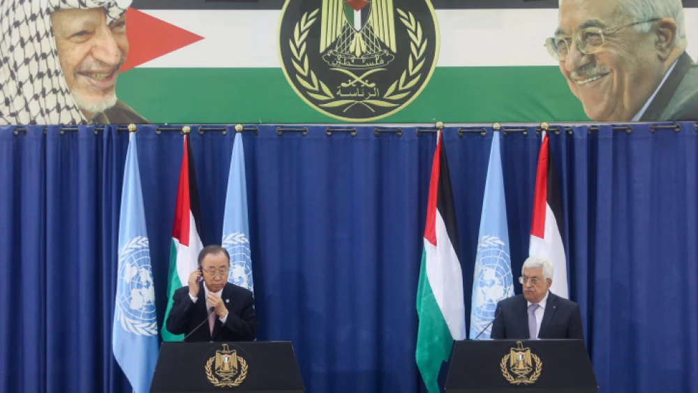 Palestinian Authority leader Mahmoud Abbas speaks during a joint press conference with U.N. Secretary General Ban Ki-Moon in Ramallah on Oct. 21, 2015. Photo by Flash90.