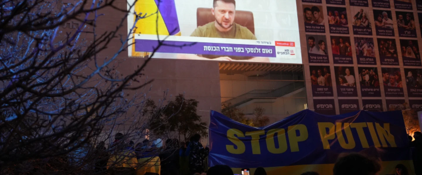 Demonstrators against the Russian invasion of Ukraine attend a televised video address by Ukraine's President Volodymyr Zelenskyy, in Tel Aviv on March 20, 2022. Photo by Chen Leopold/Flash90.