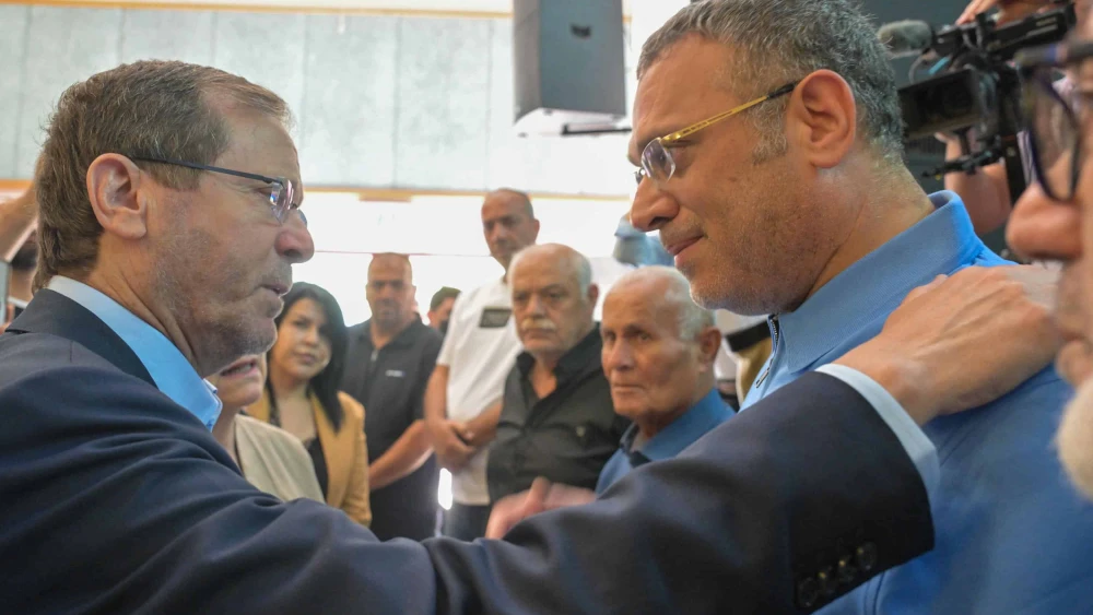 Israeli President Isaac Herzog visits the northern town of Tamra, where four young women were killed by an Iranian missile strike, June 18, 2025. Photo by Kobi Gideon/GPO.