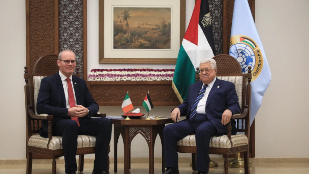 Palestinian Authority leader Mahmoud Abbas meets with Irish Foreign Minister Simon Coveney (left) at P.A. headquarters in Ramallah, on Dec. 3, 2019. Photo by Flash90.