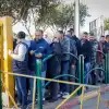 Palestinian workers line up at the entrance to Ma'ale Adumim near Jerusalem, Feb. 23, 2023. Photo by Erik Marmor/Flash90.
