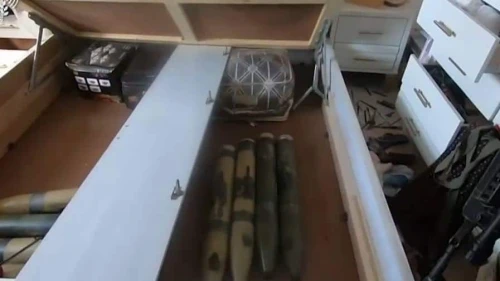 Rockets hidden under a children's bed in the Gaza Strip, Nov. 16, 2023. Credit: Israel Defense Forces Spokesperson's Unit.