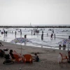 Israelis enjoy the beach on a hot day in Tel Aviv, on Aug. 29, 2019. Photo by Hadas Parush/Flash90.
