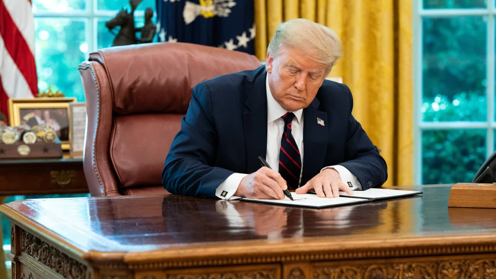 U.S. President Donald Trump signs a Presidential Memorandum on Excluding Illegal Aliens From the Apportionment Base Following the 2020 Census on July 21, 2020, in the Oval Office of the White House. Credit: Joyce N. Boghosian/The White House.