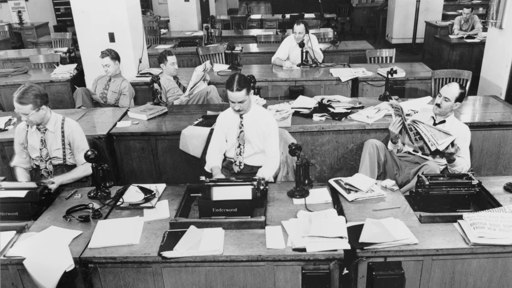 “The New York Times” newsroom, 1942. Credit: Marjory Collins/United States Library of Congress Prints and Photographs Division via Wikimedia Commons.