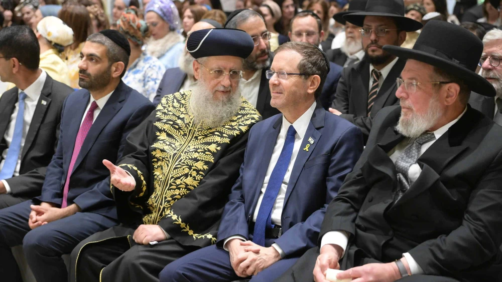 Israeli President Isaac Herzog seated between Sephardic Chief Rabbi David Yosef and Ashkenazi Chief Rabbi Kalman Ber at the President's Residence in Jerusalem, June 10, 2025. Credit: Amos Ben-Gershom (GPO).