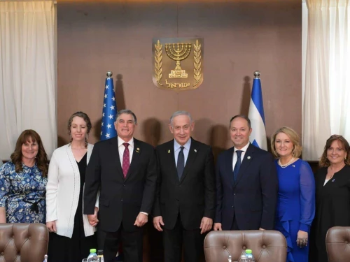 Israeli Prime Minister Benjamin Netanyahu is flanked by Reps. Andrew Clyde (fourth from left) and Marlin Stutzman (third from right) in Jerusalem on May 27, 2025. Photo by Amos Ben-Gershom/GPO.