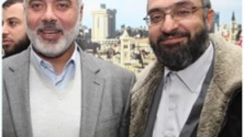 Amin Abu Rashed (right) with Hamas leader Ismail Haniyeh. Source: Facebook.