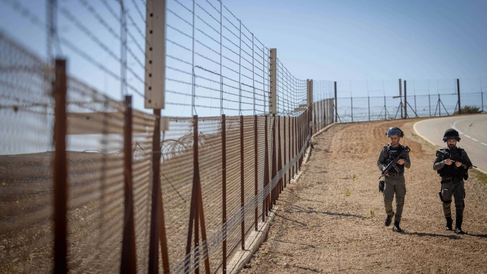 Israel Border Police officers patrol the security fence near Beit Iksa in Judea, March 12, 2024. Photo by Chaim Goldberg/Flash90.