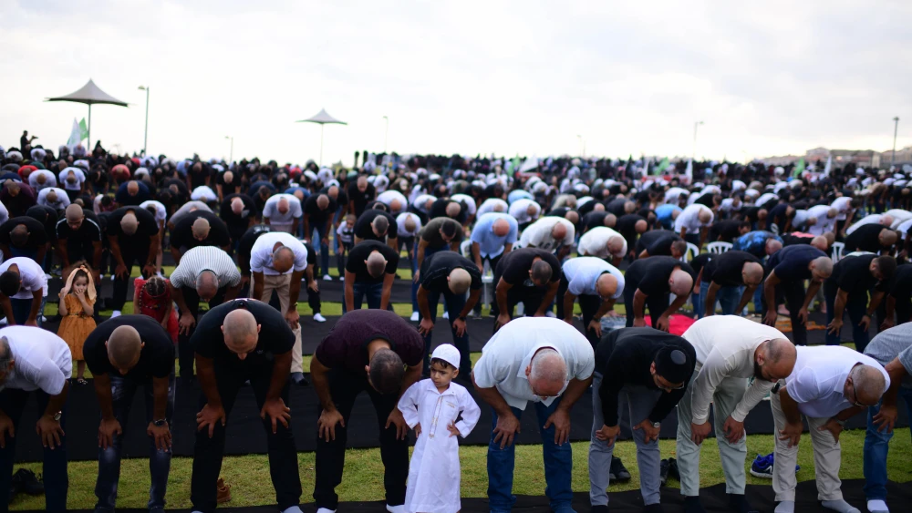Arab Israelis attend a prayer as they mark the Muslim holiday of Eid al-Adha, in Jaffa, on July 9, 2022. Photo by Tomer Neuberg/Flash90.