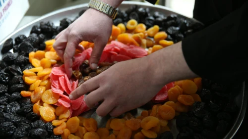 Dried fruits are prepared for a Tu B’Shevat holiday celebration in Meron, in northern Israel on Jan. 20, 2019. Photo by David Cohen/Flash90.
