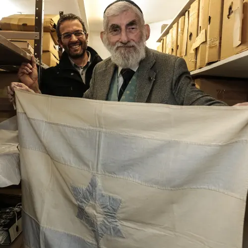 An Israeli flag created by Rebecca Affachiner, often called “the Betsy Ross of Israel,” donated to the Ben-Gurion Archives at the university’s Sde Boker Campus. Credit: American Associates, Ben-Gurion University of the Negev.