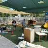 Volunteers set up a kindergarten playground at Kibbutz Nir Am, Aug. 20, 2024. Photo by Debbie Dash.