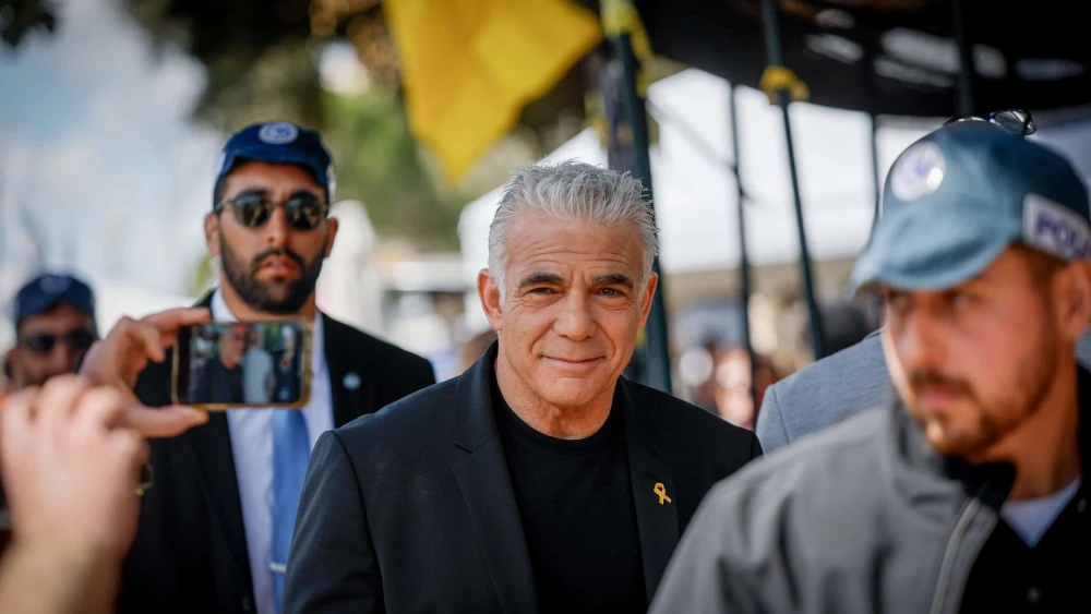 Israeli opposition leader Yair Lapid attends a protest outside the Prime Minister's Office in Jerusalem, March 19, 2025. Photo by Yonatan SIndel/Flash90.