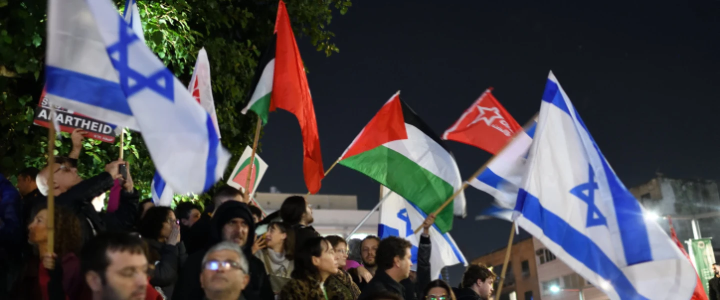 Palestinian flags waved at the rally against Israeli Prime Minister Benjamin Netanyahu's judicial reforms in Tel Aviv, Jan. 14, 2023. Photo by Gili Yaari /Flash90.