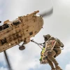 An Israel Defense Forces soldier is hoisted by a military helicopter, in an undated handout released by the military. Credit: IDF Spokesperson's Unit.
