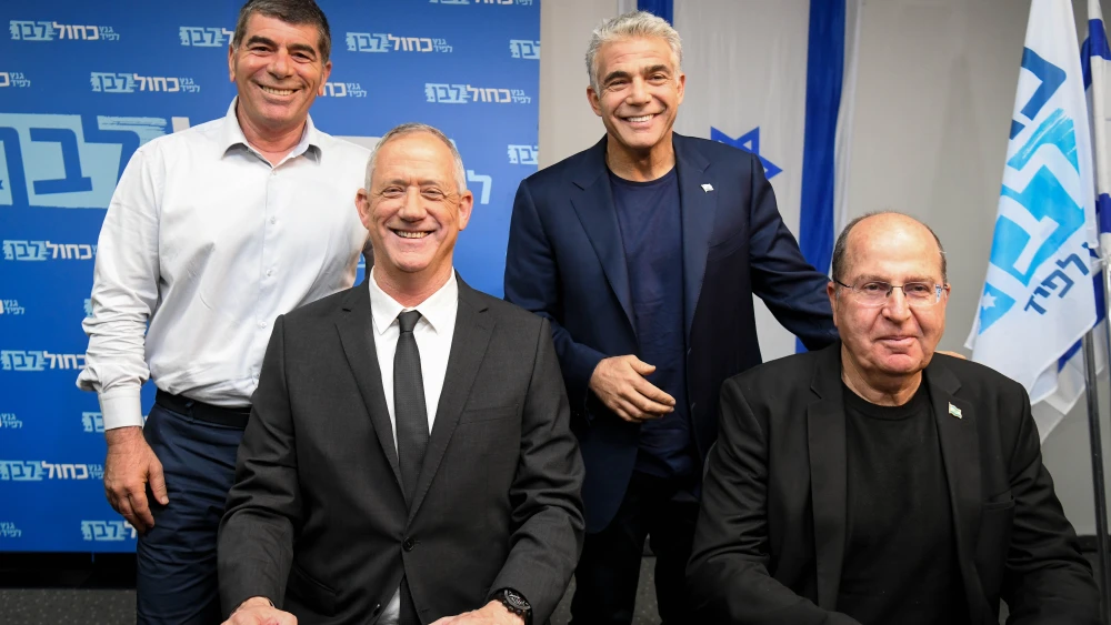 Members of the Blue White Party: Benny Gantz (2L), Boogie Yaalon, Gabi Ashkenazi and Yair Lapid hold a press conference at the party headquarters in Tel Aviv, on April 10, 2019. Credit: Flash90
