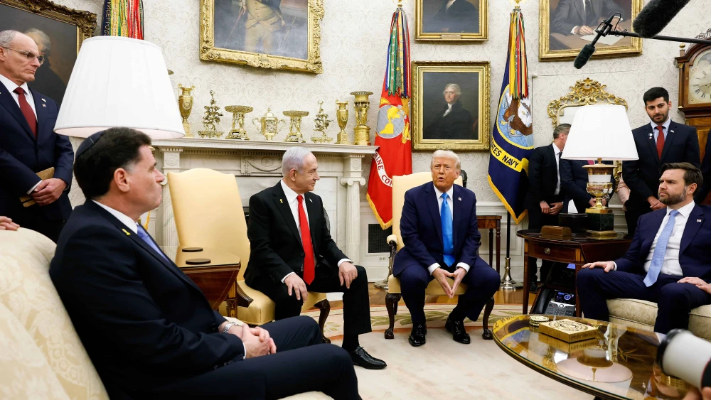 U.S. President Donald Trump, accompanied by (L-R) Israeli Minister of Strategic Affairs Ron Dermer, Israeli Prime Minister Benjamin Netanyahu, and U.S. Vice President JD Vance, speaks during a meeting in the Oval Office of the White House on February 04, 2025 in Washington, DC. Photo by Anna Moneymaker/Getty Images.