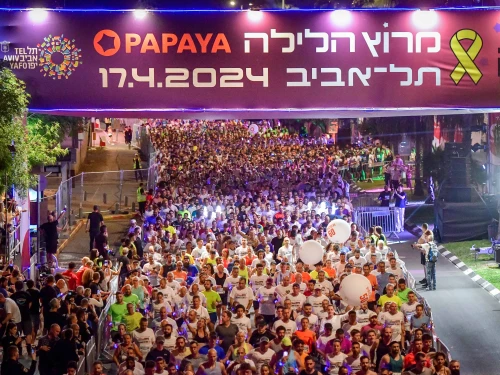 Thousands of runners take part in the Tel Aviv Night Run, for the hostages in Gaza, the IDF and the residents of southern Israel, on April 17, 2024. Photo by Avshalom Sassoni/Flash90.