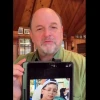 Actor Jason Alexander holds a picture of 9-year-old Ohad Munder-Zichri, Nov. 18, 2023. Source: X.