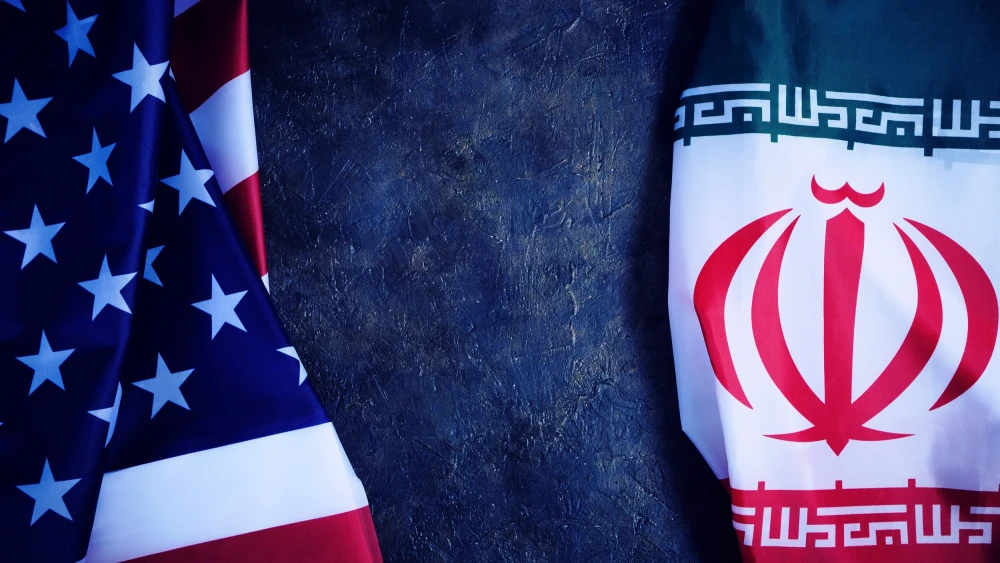 American and Iranian flags. Credit: Dmitriy Prayzel/Shutterstock.