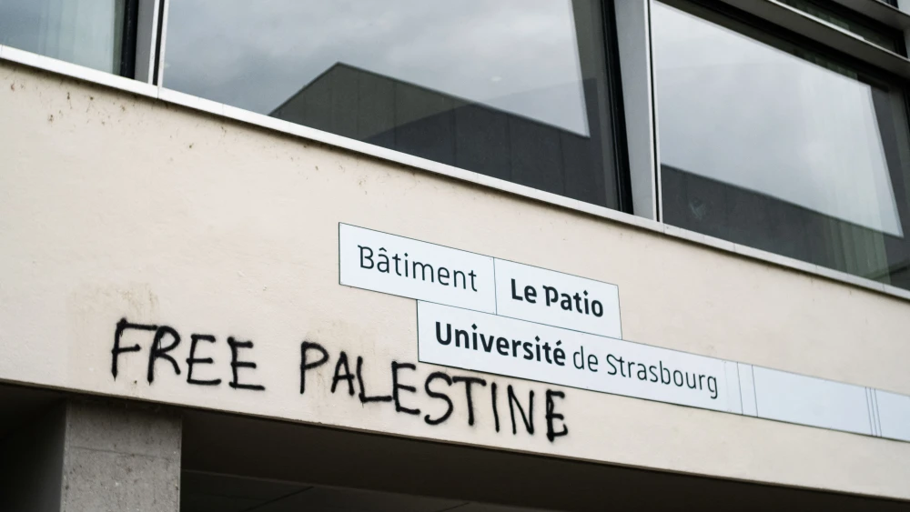 "Free Palestine" graffiti is seen on a building at the University of Strasbourg, France, on May 7, 2024. Photo by TOBIAS CANALES/Hans Lucas/AFP via Getty Images.