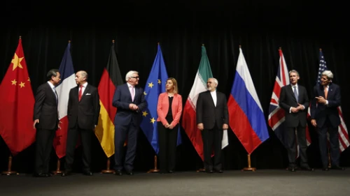 On July 14, 2015, foreign ministers and secretaries of state are pictured in Vienna, Austria, upon the announcement that Iran and the P5+1 nations had reached an agreement on Iran's nuclear program. From left to right: Wang Yi (China), Laurent Fabius (France), Frank-Walter Steinmeier (Germany), Federica Mogherini (European Union), Mohammad Javad Zarif (Iran), Philip Hammond (United Kingdom), and John Kerry (United States). Credit: Bundesministerium für Europa, Integration und Äusseres via Wikimedia Commons.