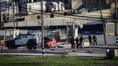 Security personnel at the scene of a Palestinian car-ramming attack near Hebron in Judea, Dec. 30, 2023. Photo by Wisam Hashlamoun/Flash90.